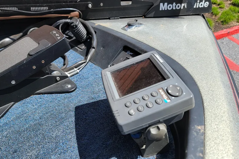 Slide: The Image of 1995 Ranger boat dashboard with Lowrance X51 sonar and MotorGuide trolling motor. - 9