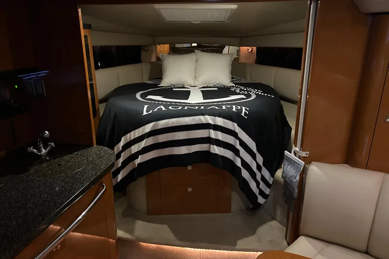 Slide: The Image of Luxurious interior of 2010 Chaparral Signature 370 yacht with cozy bed and elegant decor. - 18