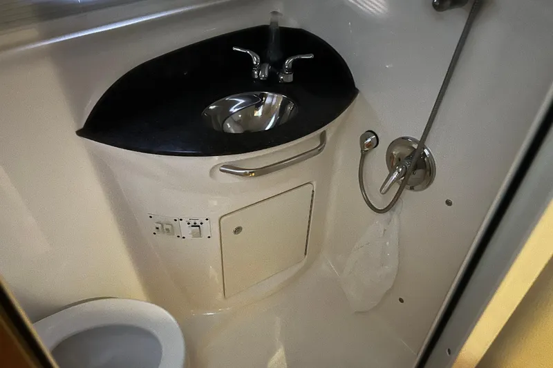 Slide: The Image of Bathroom interior of 2010 Chaparral Signature 370 yacht with sink and shower. - 20