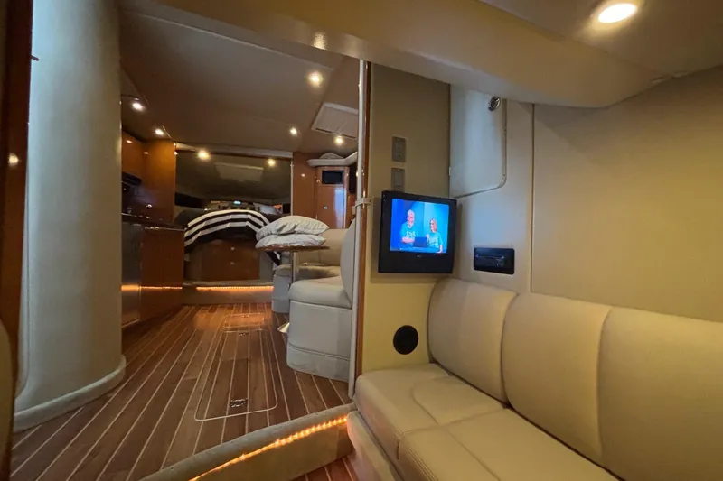 Slide: The Image of Luxurious interior of 2010 Chaparral Signature 370 yacht with cozy seating and modern amenities. - 33