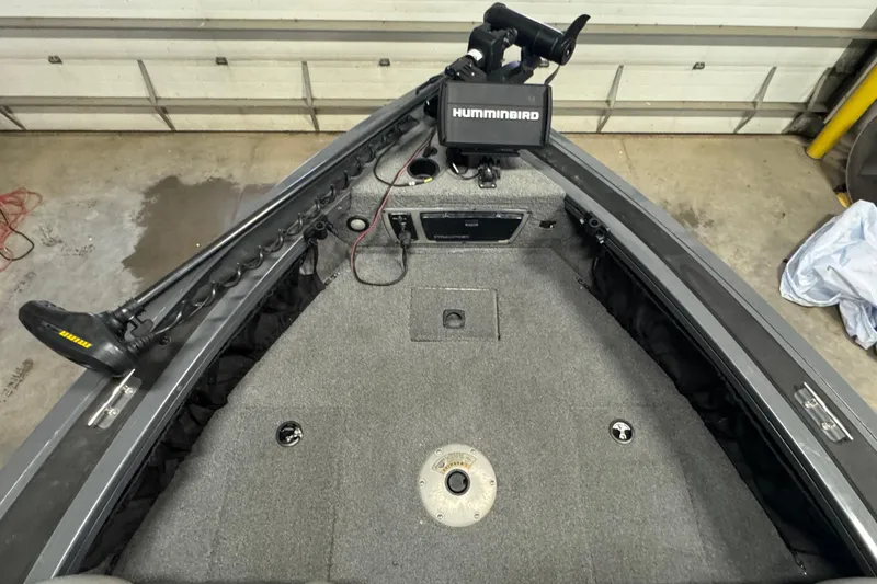 Slide: The Image of 2017 Tracker Targa V-18 WT boat interior with Humminbird fish finder and trolling motor. - 12