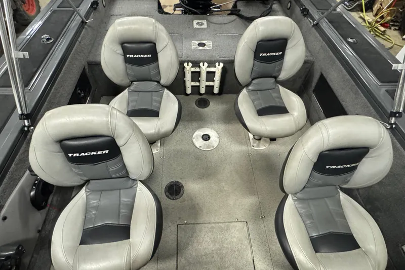 Slide: The Image of 2017 Tracker Targa V-18 WT boat interior with four cushioned seats. - 8