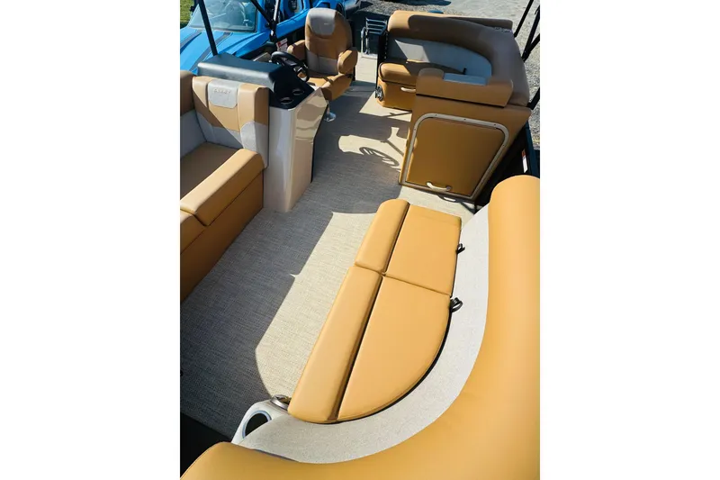 Slide: The Image of Interior of 2026 Crest Conquest SE 200 Cruise pontoon boat with tan seating. - 9