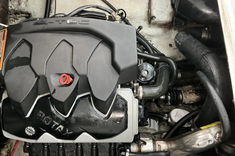 Slide: The Image of Engine of a 2005 Sea-Doo Sportster boat, featuring Rotax 4-TEC technology. - 10
