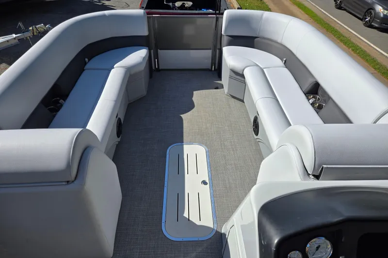 Slide: The Image of 2022 Bentley Pontoons 240 Cruise XL interior with spacious seating and modern design. - 14