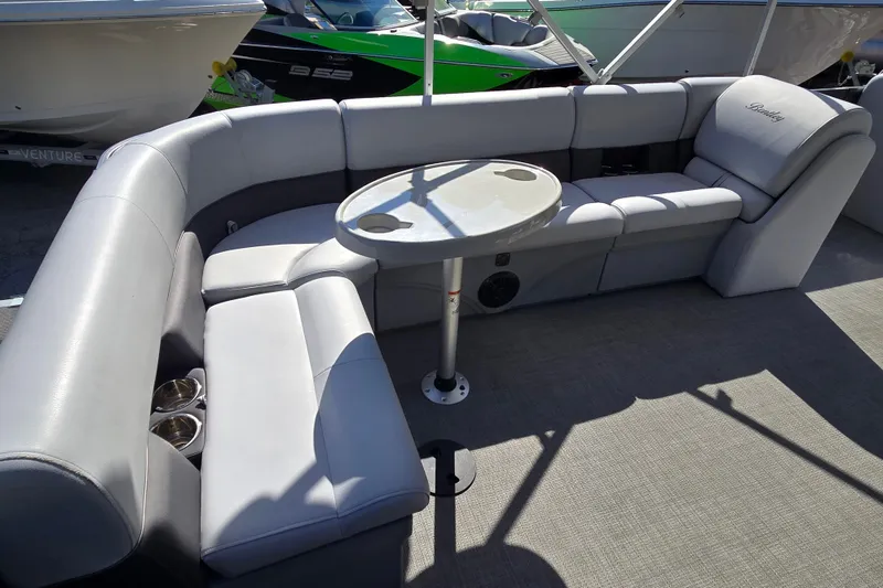 Slide: The Image of Luxurious seating area on a 2022 Bentley Pontoons 240 Cruise XL Legacy boat. - 18