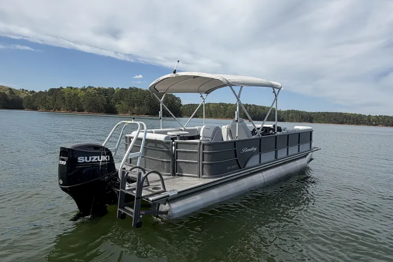 Slide: The Image of 2022 Bentley Pontoons 240 Cruise XL Legacy on water, featuring Suzuki 200HP engine. - 7