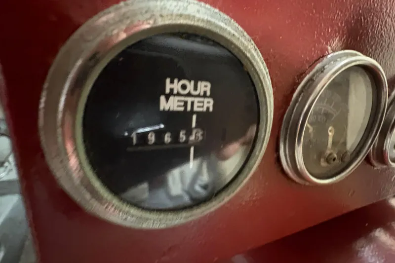 Slide: The Image of Hour meter reading 1965.5 on 1985 Hatteras 60 Convertible boat dashboard. - 50