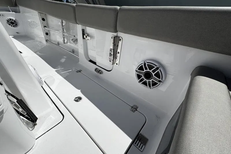 Slide: The Image of 2026 Sportsman Heritage 261 Center Console interior with seating and speaker detail. - 23