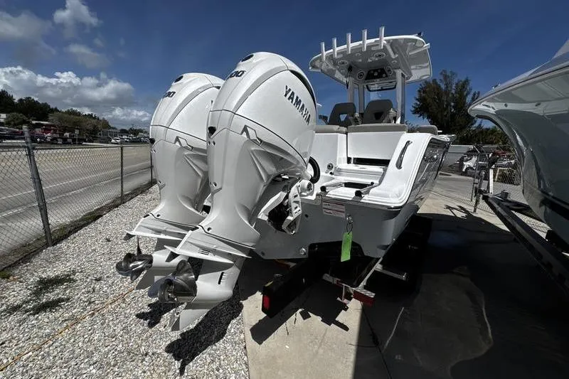 Slide: The Image of 2026 Sportsman Heritage 261 Center Console with dual Yamaha outboard engines. - 27