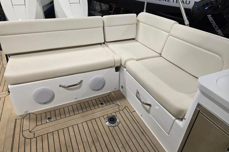 Slide: The Image of Luxurious seating area on 2026 MJM 3 boat with beige cushions and integrated speakers. - 11