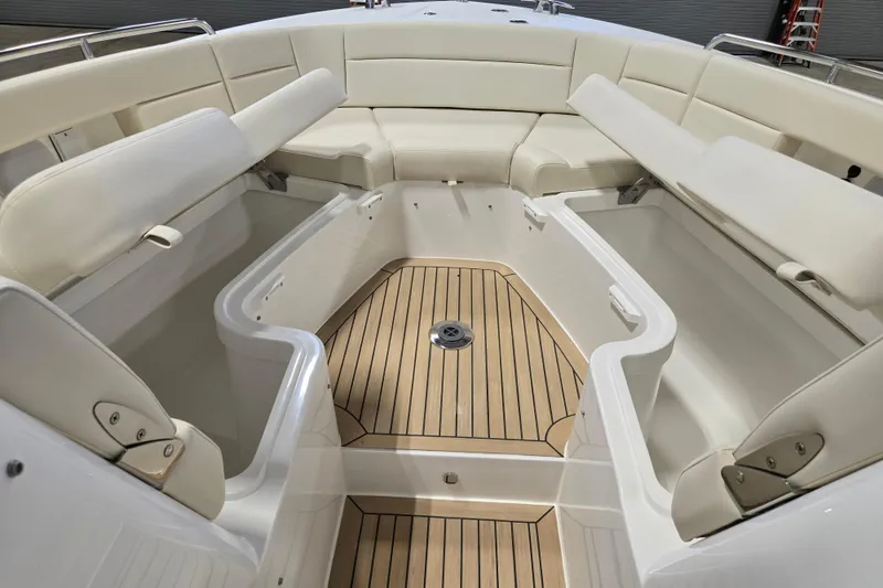 Slide: The Image of Luxurious 2026 MJM 3 boat interior with spacious seating and elegant wood flooring. - 13