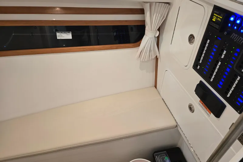 Slide: The Image of Interior of 2026 MJM 3 boat with seating and control panel. - 16