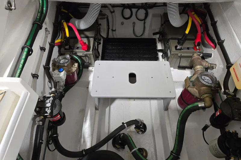 Slide: The Image of Engine compartment of 2026 MJM 3 boat with visible wiring and components. - 29