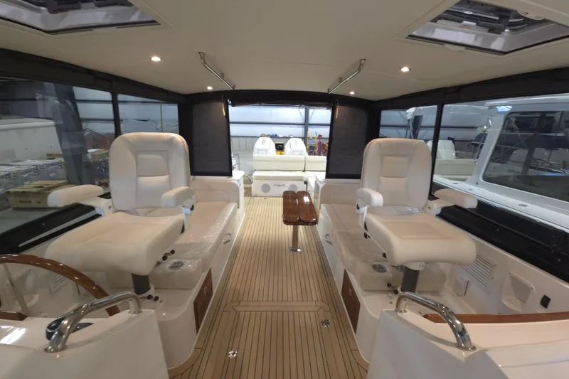 Slide: The Image of Luxurious interior of 2026 MJM 3 yacht with plush seating and sleek design. - 3