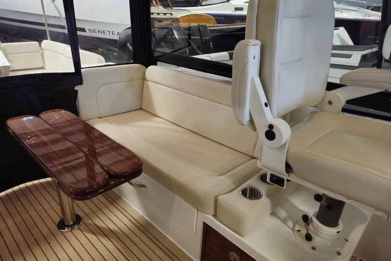Slide: The Image of Luxurious interior of 2026 MJM 3 boat with elegant seating and wooden table. - 5