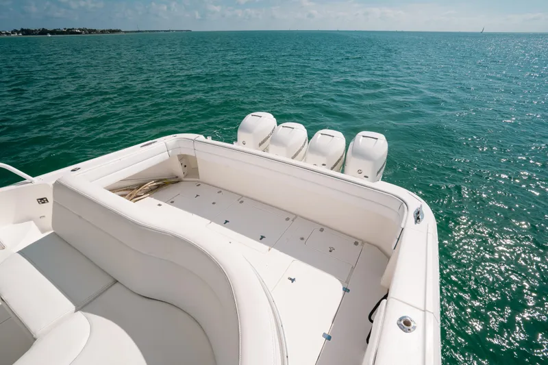 Slide: The Image of 2009 Intrepid 475 Sport Yacht with four engines on open sea. - 29