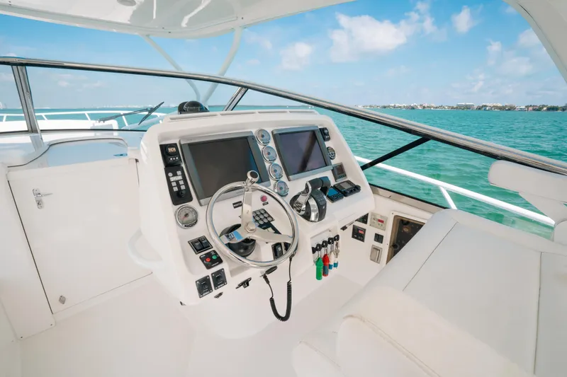 Slide: The Image of Helm of 2009 Intrepid 475 Sport Yacht with modern controls and ocean view. - 31