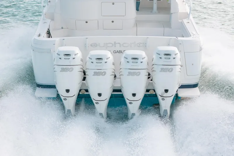 Slide: The Image of 2009 Intrepid 475 Sport Yacht with four powerful outboard engines on the water. - 70