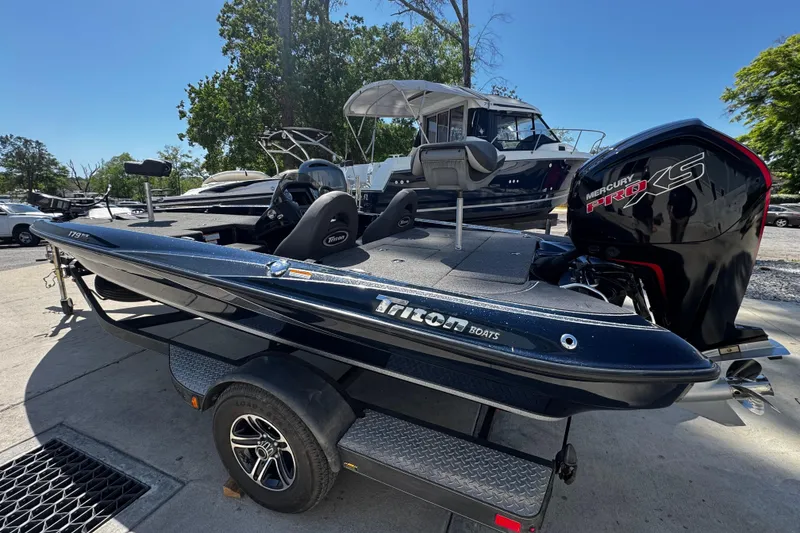 The Image of 2022 Triton 179 TrX boat with Mercury Pro XS engine on trailer. - 1