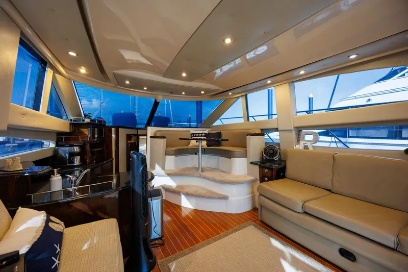 Slide: The Image of Luxurious interior of a 2010 Meridian 391 Sedan yacht with elegant seating and modern amenities. - 11