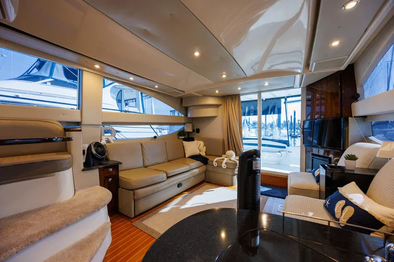 Slide: The Image of Luxurious interior of 2010 Meridian 391 Sedan yacht with plush seating and modern amenities. - 12