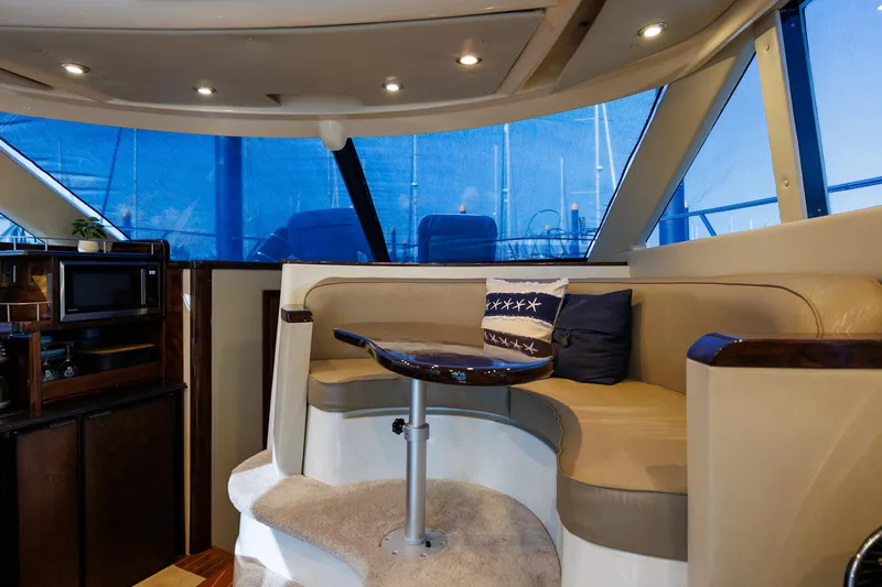 Slide: The Image of Luxurious interior of 2010 Meridian 391 Sedan yacht with plush seating and elegant decor. - 15