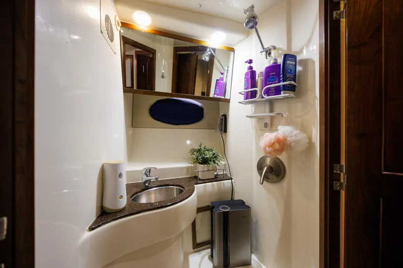 Slide: The Image of Luxurious bathroom in 2010 Meridian 391 Sedan yacht with modern fixtures and amenities. - 20