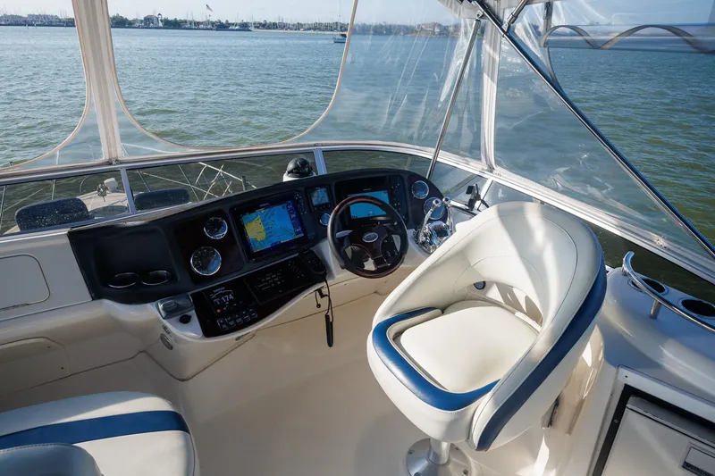 Slide: The Image of Helm of 2010 Meridian 391 Sedan yacht with navigation equipment and captain's chair. - 26