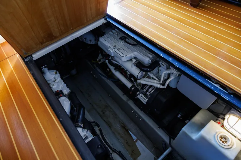 Slide: The Image of Engine compartment of a 2010 Meridian 391 Sedan yacht with wooden flooring. - 43