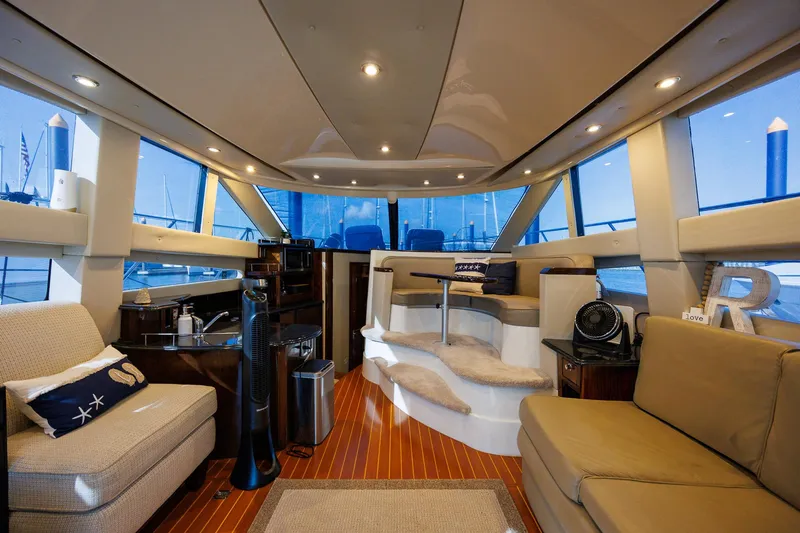 Slide: The Image of Luxurious interior of a 2010 Meridian 391 Sedan yacht with plush seating and modern amenities. - 7