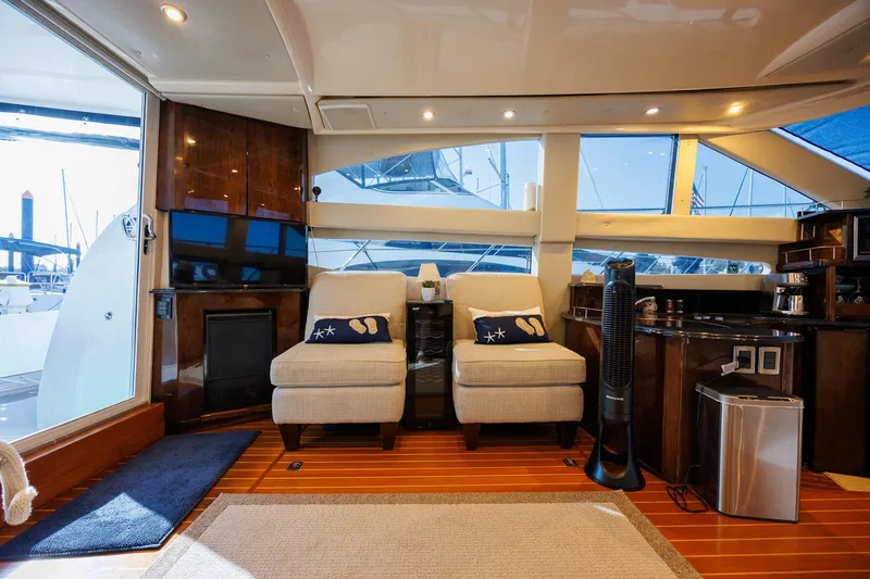 Slide: The Image of Luxurious interior of a 2010 Meridian 391 Sedan yacht with comfortable seating and modern amenities. - 8