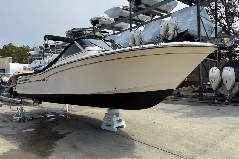 Slide: The Image of 2018 Grady-White Freedom 235 boat on dry dock, ready for maintenance. - 11