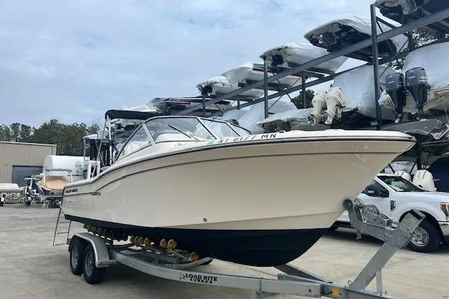 Slide: The Image of 2018 Grady-White Freedom 235 boat on trailer in storage facility. - 3