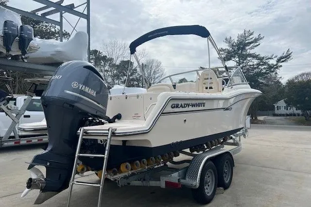 Slide: The Image of 2018 Grady-White Freedom 235 boat on trailer with Yamaha outboard motor. - 5