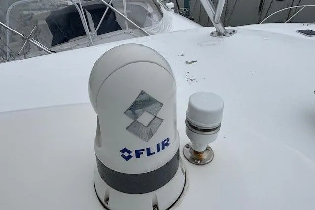 Slide: The Image of FLIR camera on 2007 Viking 52 Convertible yacht deck, showcasing marine technology. - 8