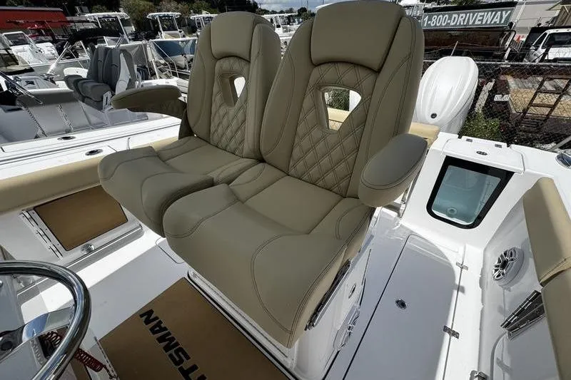 Slide: The Image of Luxurious seating on 2026 Sportsman Open 262 Center Console boat. - 23