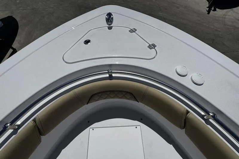 Slide: The Image of Bow seating area of 2026 Sportsman Open 262 Center Console boat. - 5