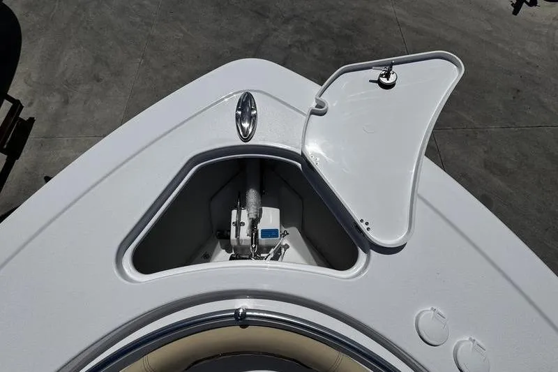 Slide: The Image of 2026 Sportsman Open 262 Center Console anchor compartment with open hatch. - 6