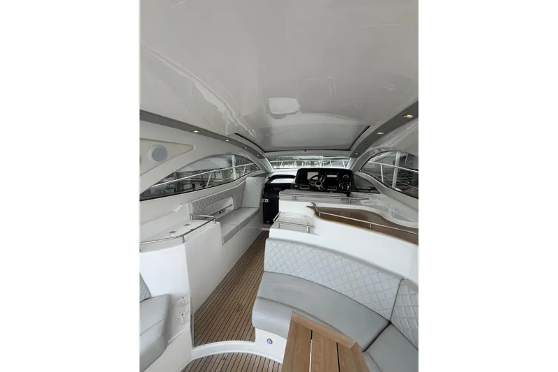 Slide: The Image of Interior of 2022 Schaefer 400 Sport yacht, featuring sleek design and luxurious seating. - 12