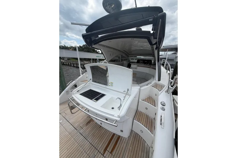 Slide: The Image of 2022 Schaefer 400 Sport yacht with open deck and sleek design. - 15