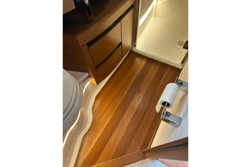 Slide: The Image of Luxurious wooden bathroom interior of 2022 Schaefer 400 Sport yacht. - 17