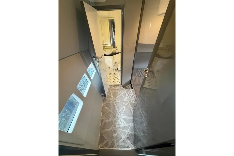 Slide: The Image of Interior view of 2022 Schaefer 400 Sport yacht bathroom with modern design and fixtures. - 19