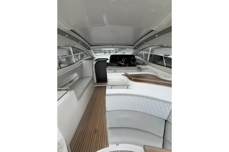 Slide: The Image of Interior of 2022 Schaefer 400 Sport yacht with elegant seating and modern design. - 27