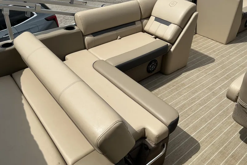 Slide: The Image of Luxurious seating on 2023 Godfrey Sweetwater 2286 SFL pontoon boat, featuring beige upholstery. - 11