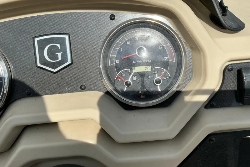 Slide: The Image of Dashboard of 2023 Godfrey Sweetwater 2286 SFL boat with RPM gauge. - 17