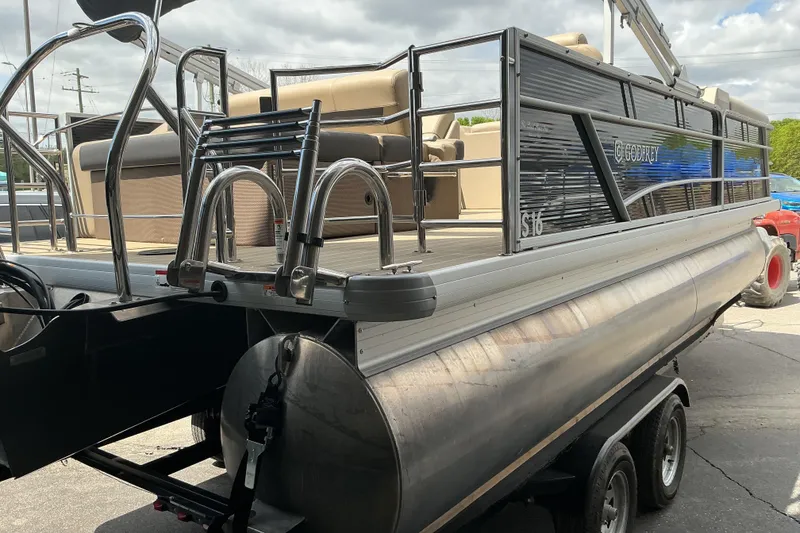 Slide: The Image of 2023 Godfrey Sweetwater 2286 SFL pontoon boat on trailer, featuring sleek design and comfortable seating. - 4