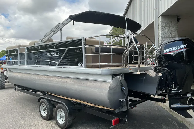 Slide: The Image of 2023 Godfrey Sweetwater 2286 SFL pontoon boat with Mercury engine on trailer. - 6