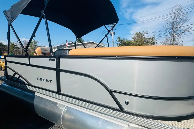 The Image of 2026 Crest Conquest SE 180 Cruise pontoon boat with canopy, side view. - 0