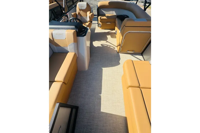 Slide: The Image of Interior of 2026 Crest Conquest SE 180 Cruise pontoon boat with tan seating. - 10